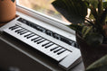 Load image into Gallery viewer, Yamaha Reface CS in window
